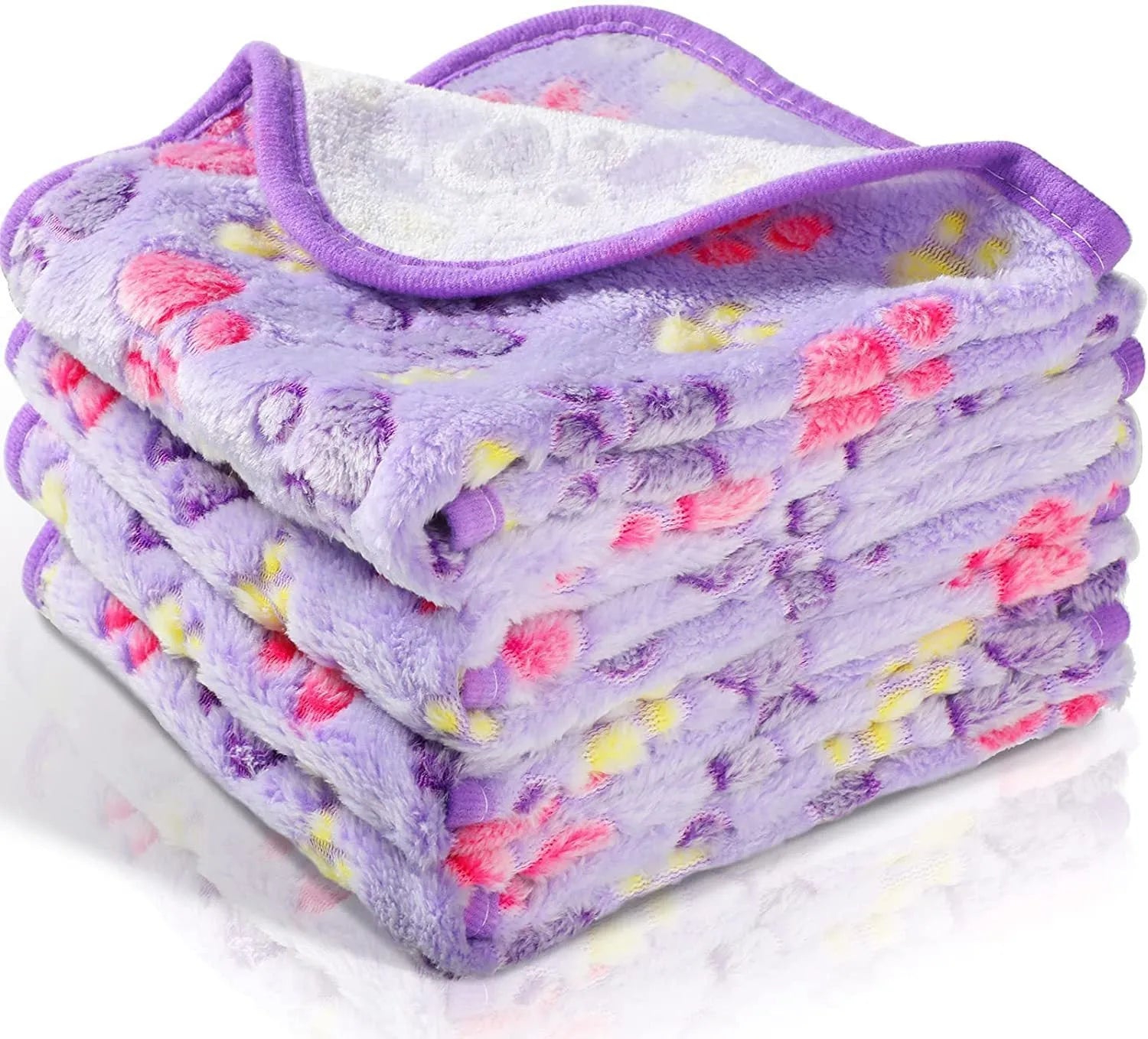 Coral fleece pet blanket with dog paw print pattern available in multiple colours and sizes for dogs and cats