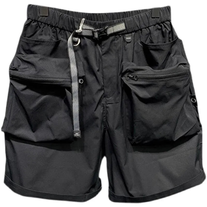 Men's black loose-fit cargo work shorts on a mannequin, showing multiple pockets and above-knee length.