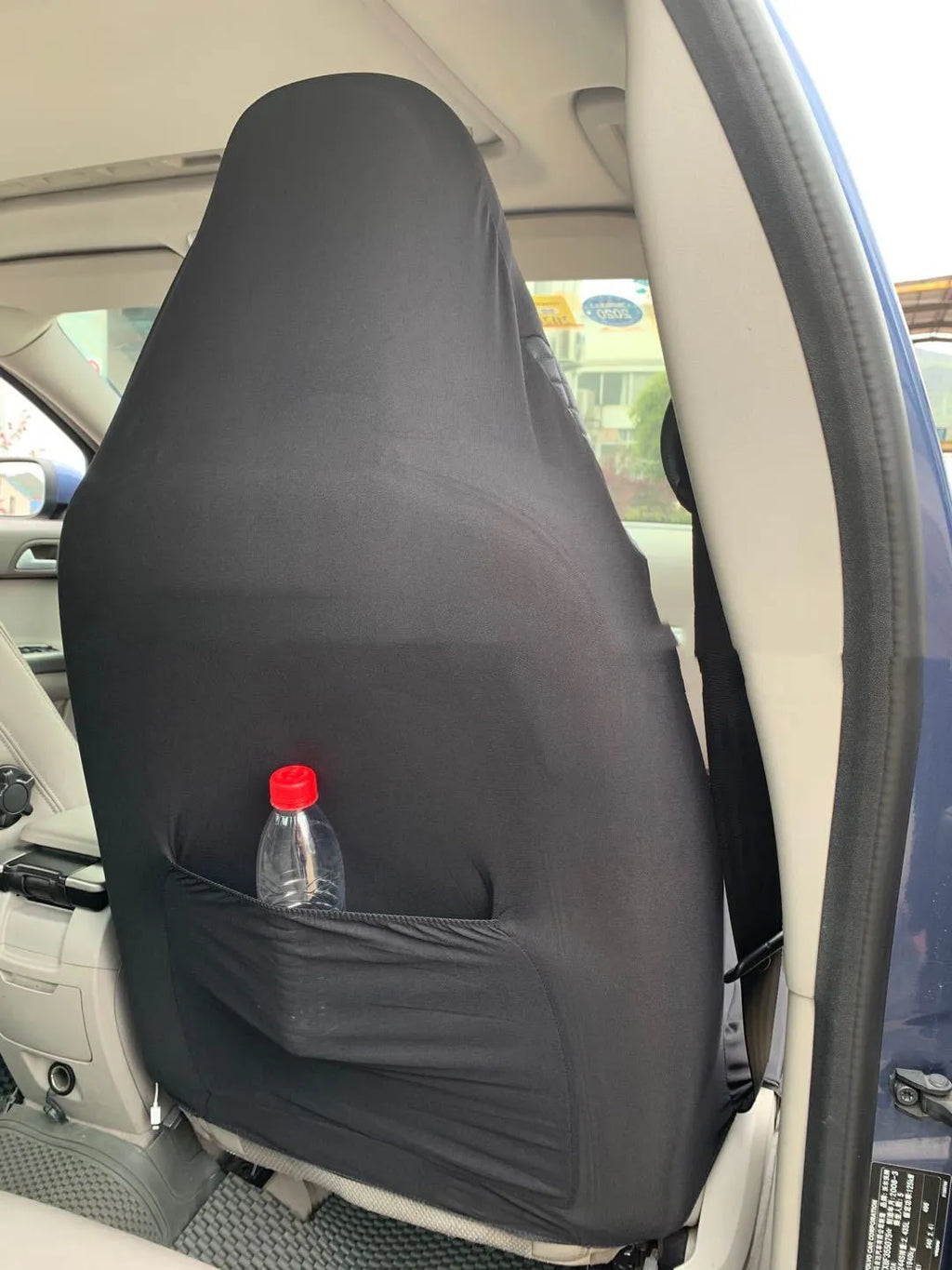 Black quilted PU universal car seat cover with sponge padding and attachment hooks