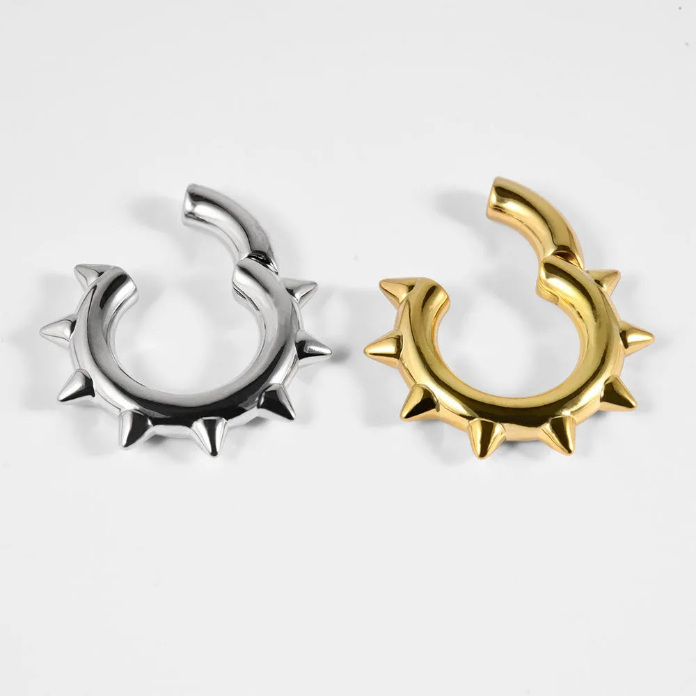 A pair of copper geometric magnetic ear extenders with a 15mm conical round magnet in one of eight style variations.