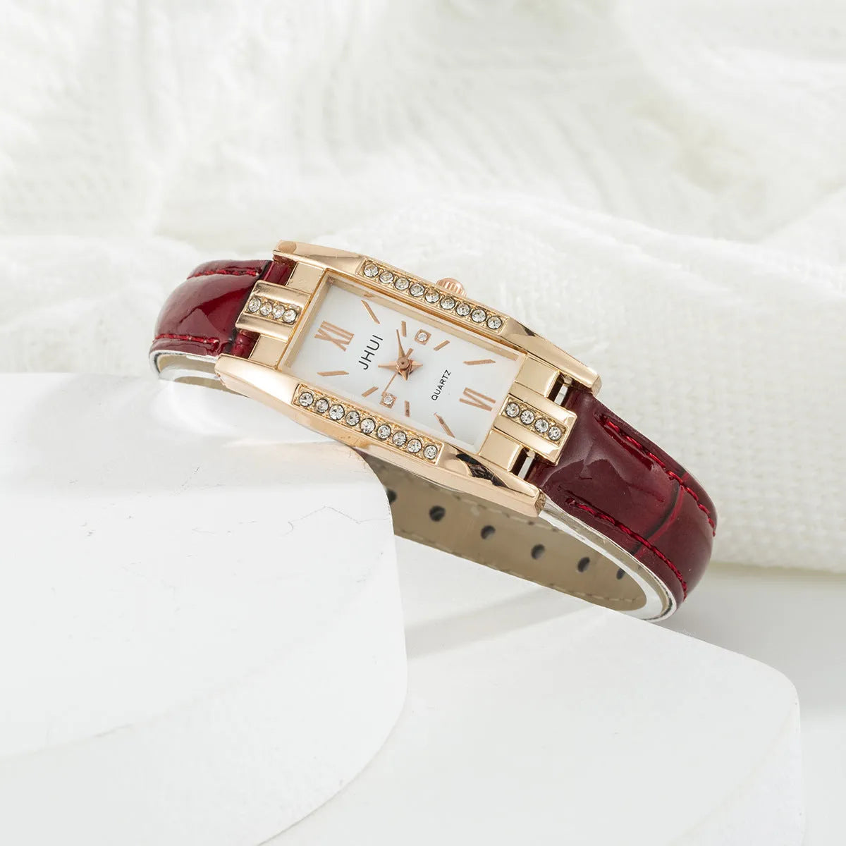 Women's rectangular quartz watch with small diamond on red PU strap, alloy case