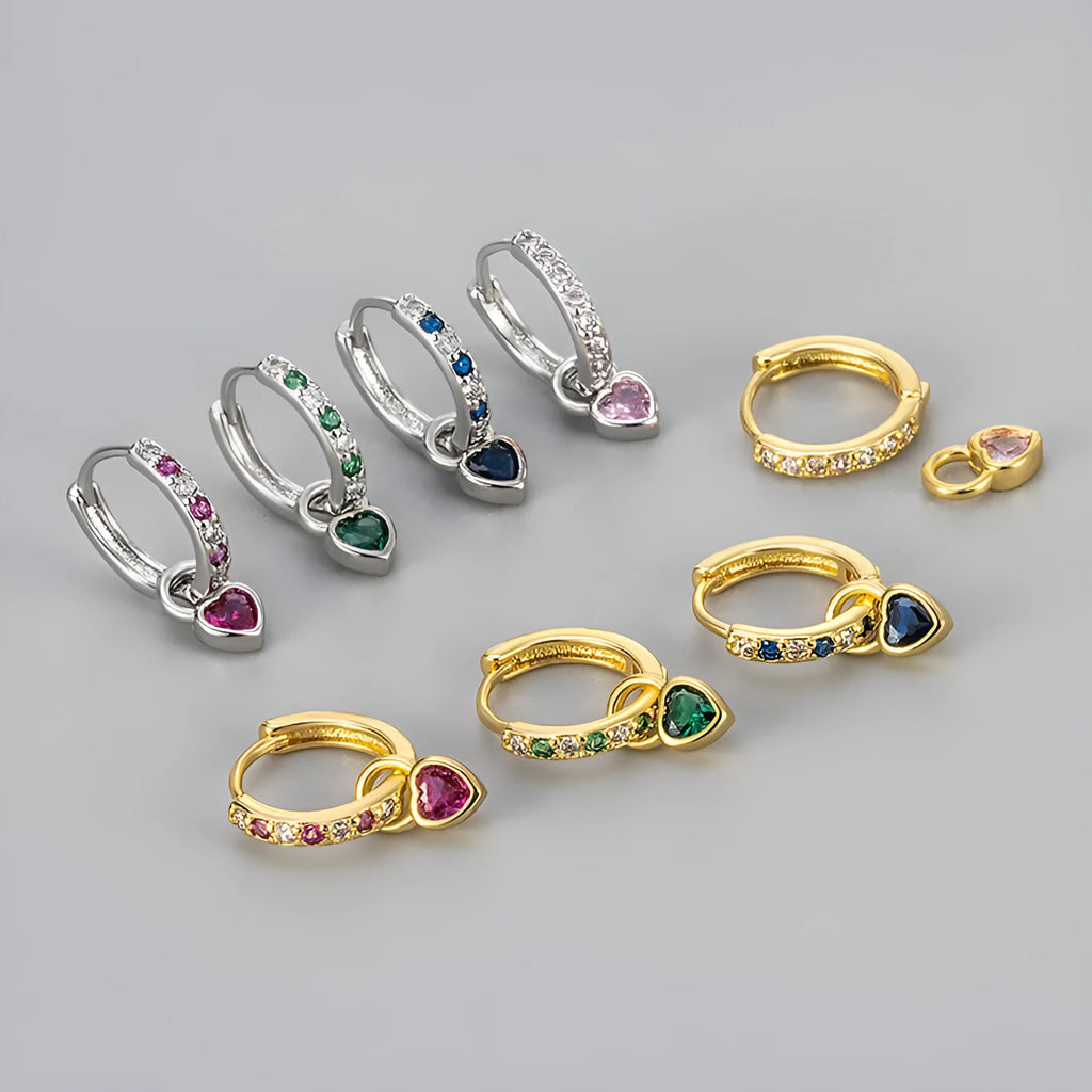 Women's heart-shaped ear clips with a coloured stone, available in gold or white gold colour.