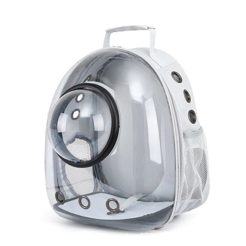 Grey hard-shell pet carrier bag with side opening for medium-sized cats or small dogs.