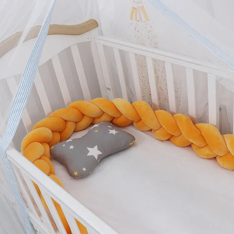 Soft spandex velvet baby crib bumper protector shown in a light grey colour, shaped around white crib bars.