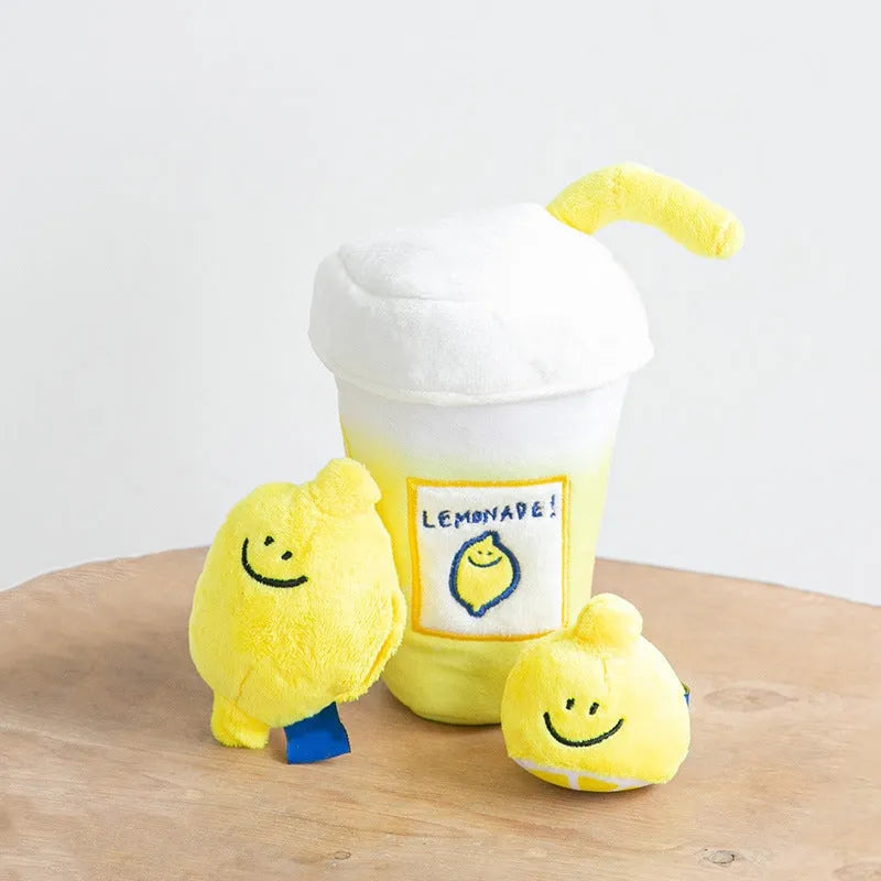 Yellow plush lemon tea cup pet toy with snack pocket, BB call squeaker, and separate cup component.