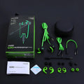 Shuangmai wired computer gaming headset in black, green and red colour options showing in-ear design and 1.5 metre cable