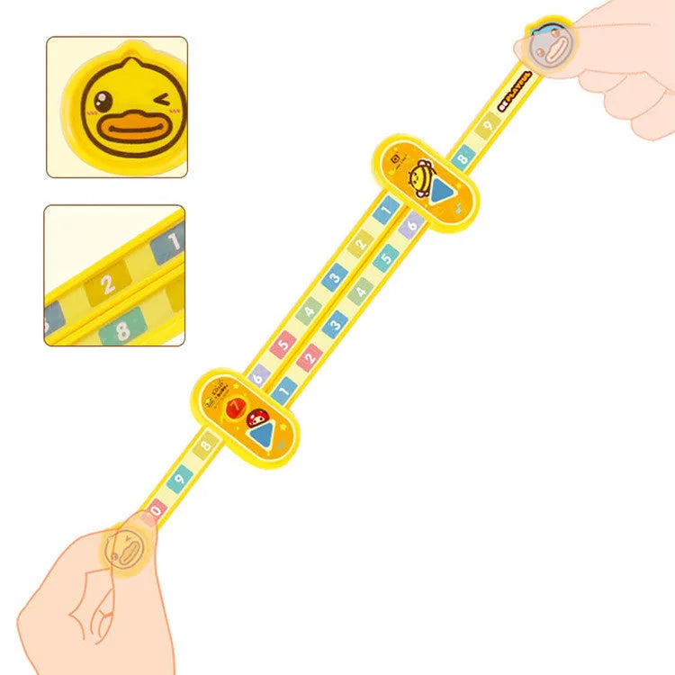Yellow plastic children's digital decomposition ruler showing cartoon design and 24.5 cm scale