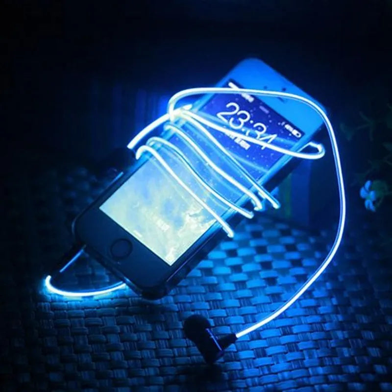Blue LED light up earphones with 3.5mm plug and in-line remote control on a dark background