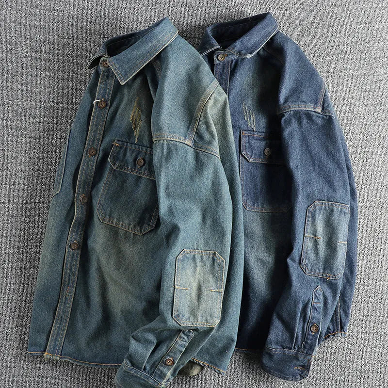 Men's light blue washed vintage denim shirt with long sleeves and a loose cardigan fit.