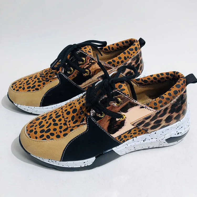Women's casual flat sneakers with wedge heel in suede upper, available in multiple pattern options
