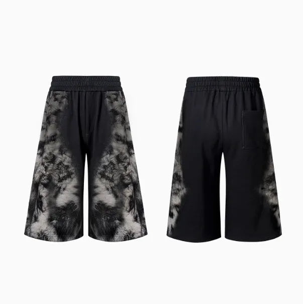 Loose fit street trendy printed trousers with polyester fabric and mid-waist design