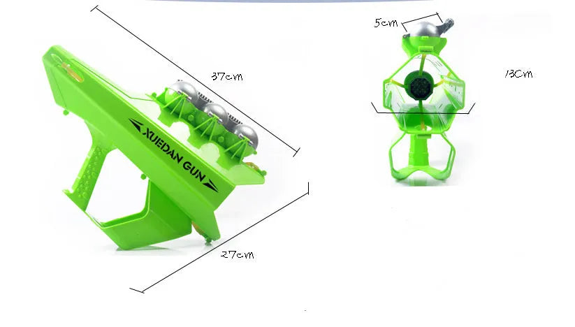 Plastic snowball clip launcher tool in black, green, and orange colours with strong rubber band