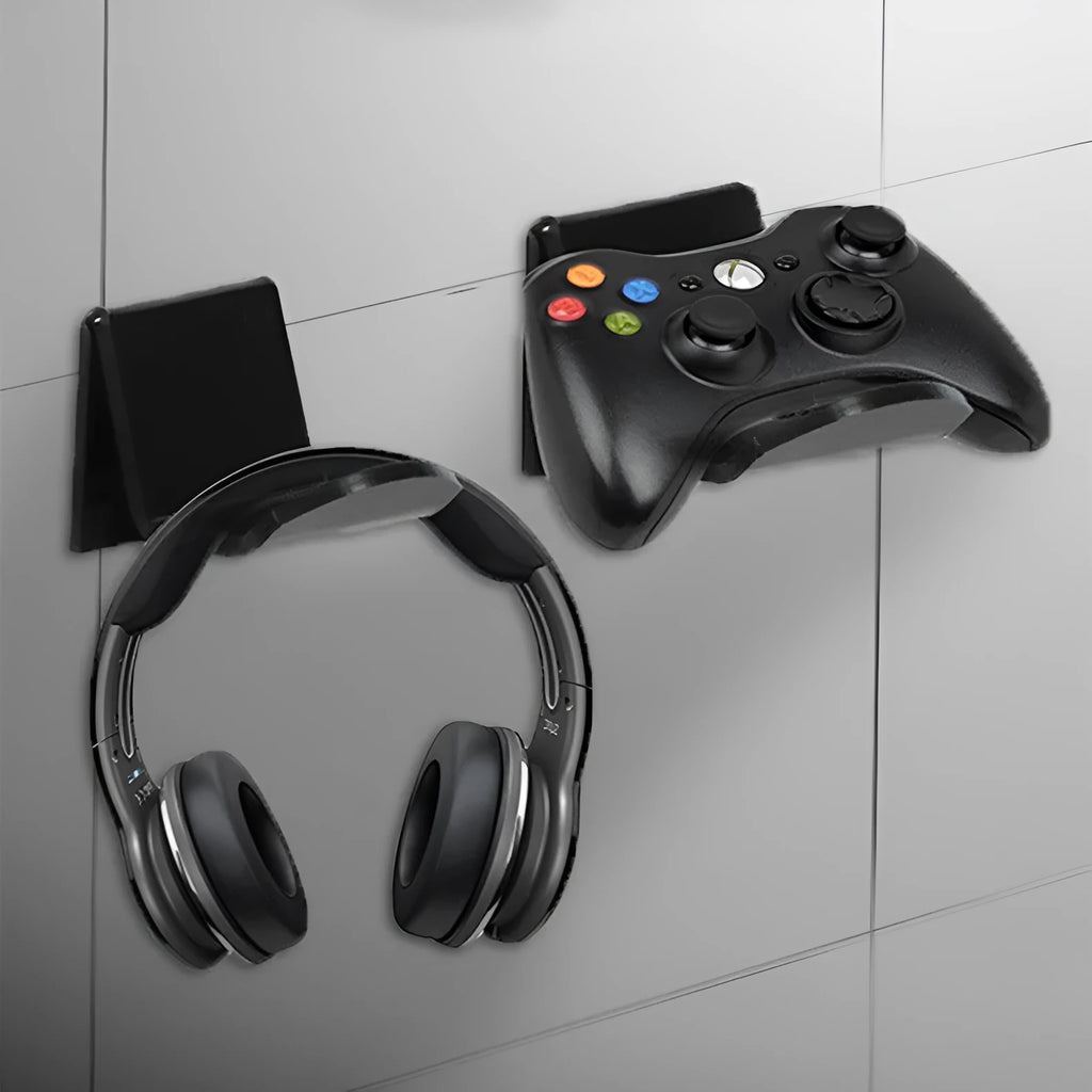 A universal plastic wall mount bracket for game controllers, shown in black, white, and transparent colour options.