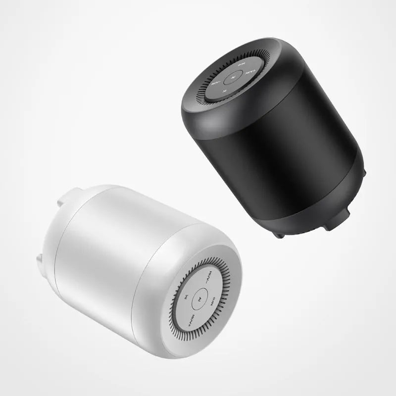 Black and white Bluetooth speaker with AI voice control showing USB port and control buttons