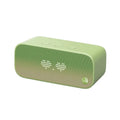 Compact Elf sugar cube AI smart WiFi speaker in blue colour on a wooden shelf