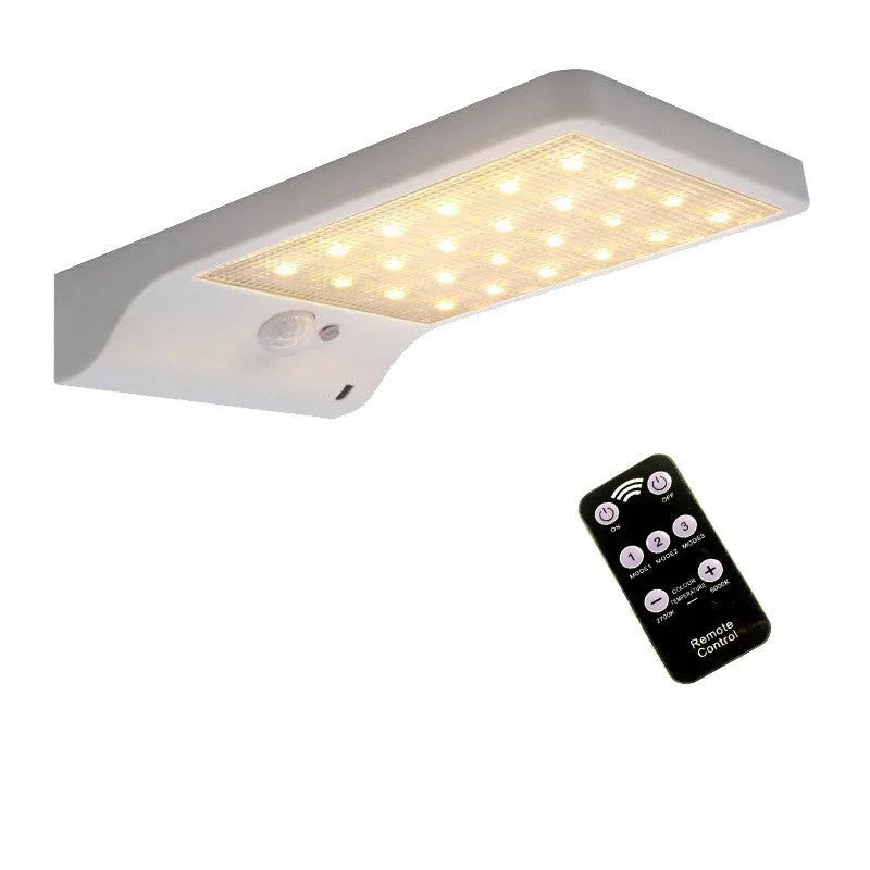 Black and white outdoor solar garden light with IP65 waterproof rating for balcony and courtyard use