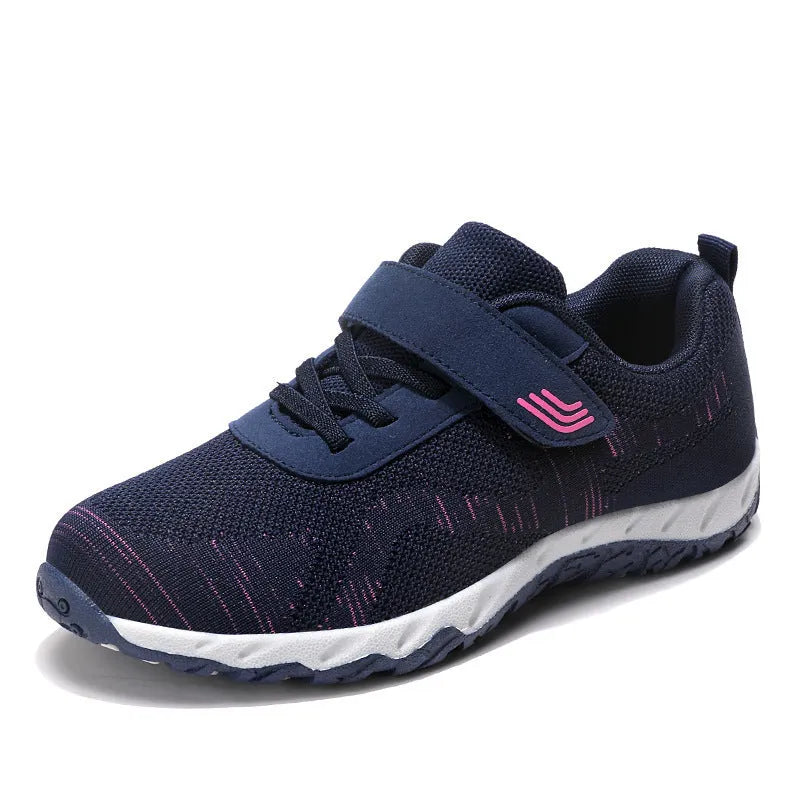 Women's low-top wedge heel shoes in grey purple with breathable mesh upper and Velcro strap.