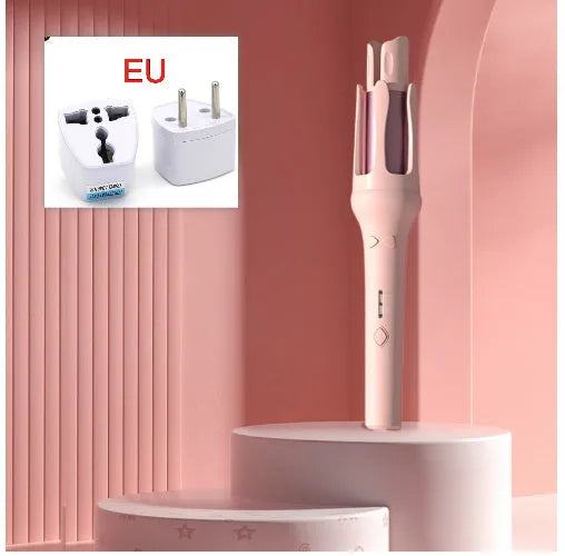Automatic hair curler with 32mm ceramic barrel in pink, showing wired power cord and included US/EU travel adapters.
