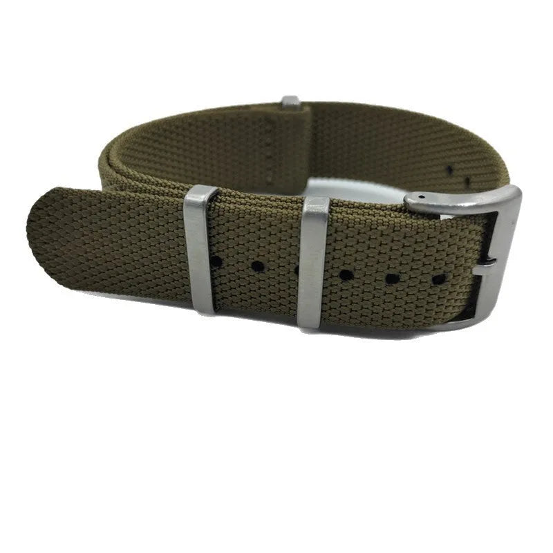 Nylon quick-release watch strap in army green, showing the integrated spring bar mechanism.