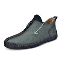 Men's black zip-up Martin boot with round toe and low heel on a white background.