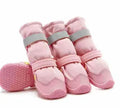 Set of four black waterproof rubber dog shoes for extended medium large breeds with non-slip soles