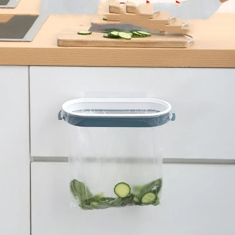 Blue plastic kitchen garbage bag storage rack for cabinet organisation.