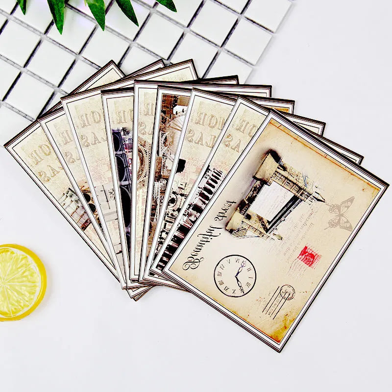 Set of nine retro-style minimalist cartoon postcards depicting the Eiffel Tower and Paris landmarks.
