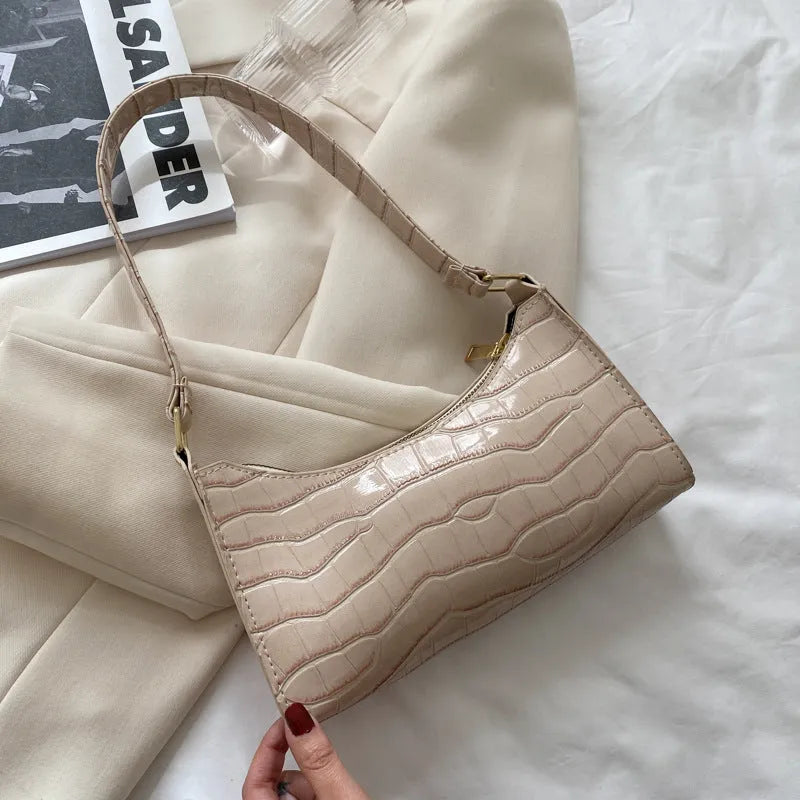 Women's small square underarm bag in PU leather, shown in multiple colour options including leopard print.