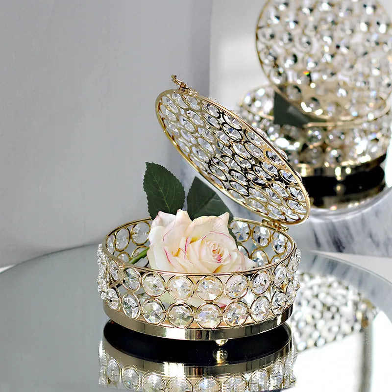 French gold European style jewellery storage box with transparent crystal glass sides and lid.