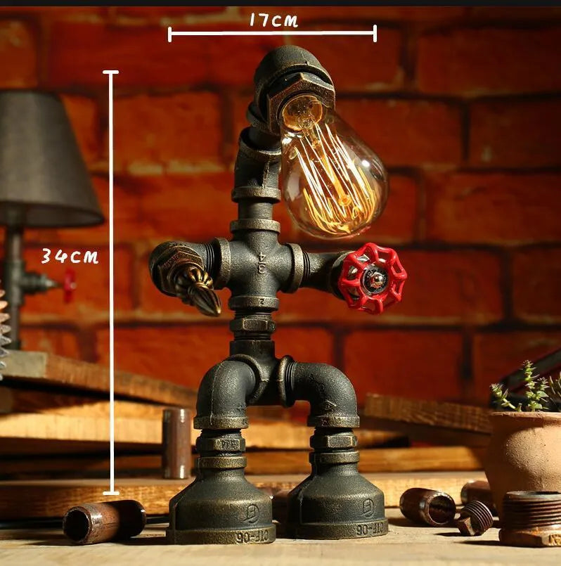 Vintage industrial robot table lamp with iron pipe design and water pipe light filtering