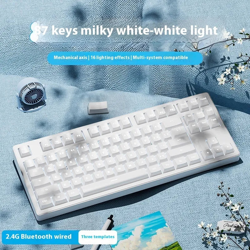 Triple-mode mechanical keyboard in various colour options showing 87-key and 108-key layouts
