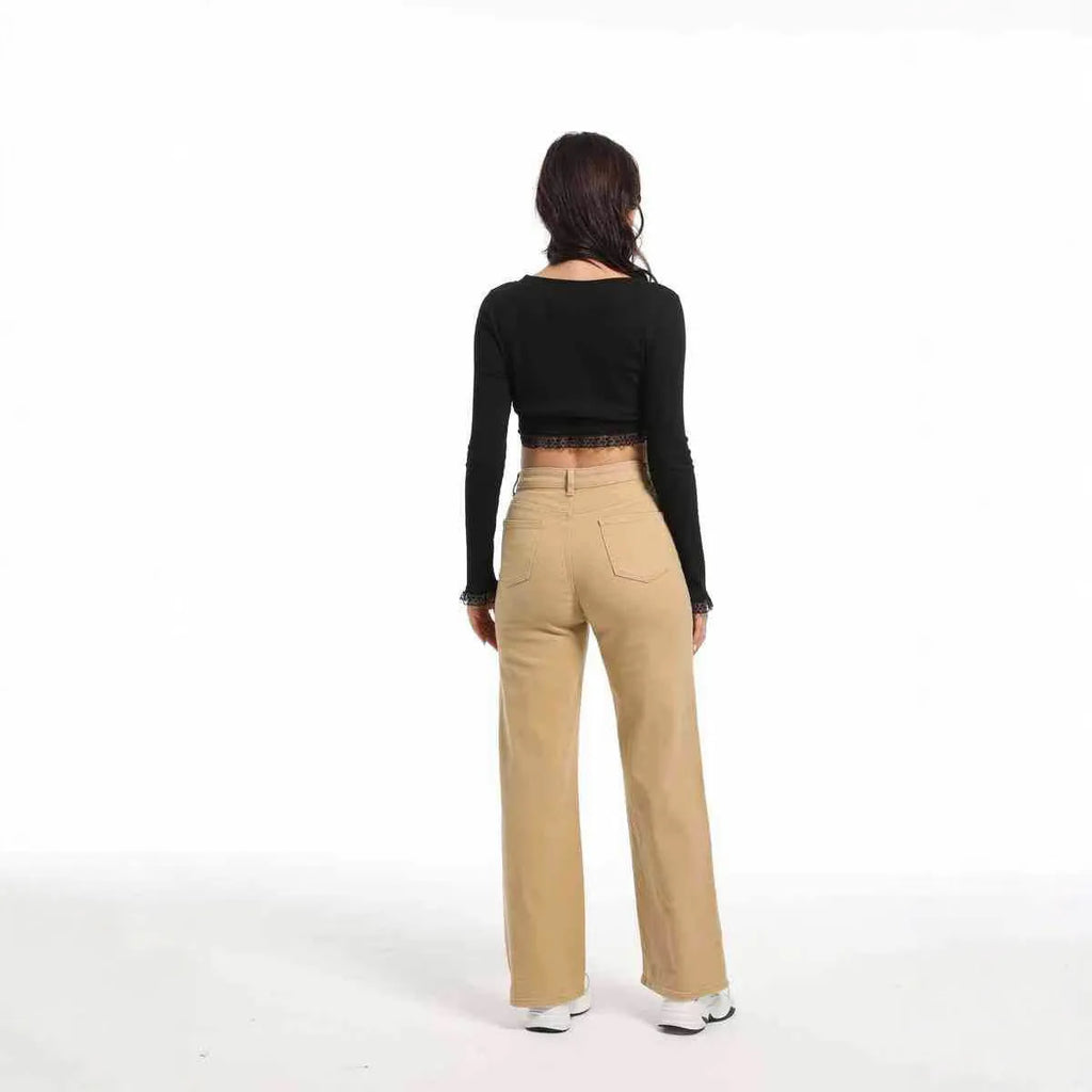 Women's high-waist straight leg wide jeans in apricot colour on a hanger.