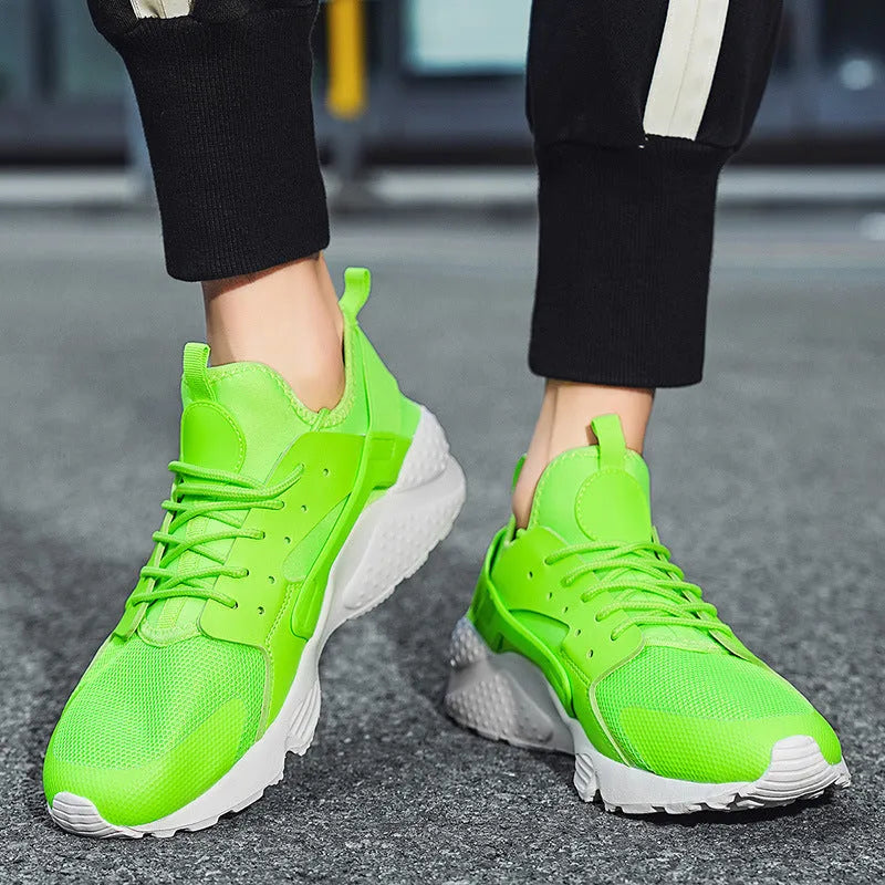 Men's low top casual shoes with mesh upper and cross shoulder straps in fluorescent colours