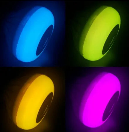 White Bluetooth speaker LED light bulb with E27 base and remote control for colour-changing mood lighting.