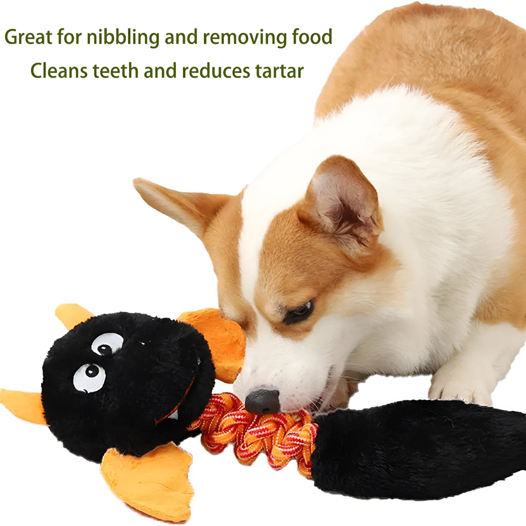 Large plush dog toy in red with cartoon design, featuring a rope knot and suitable for aggressive chewers