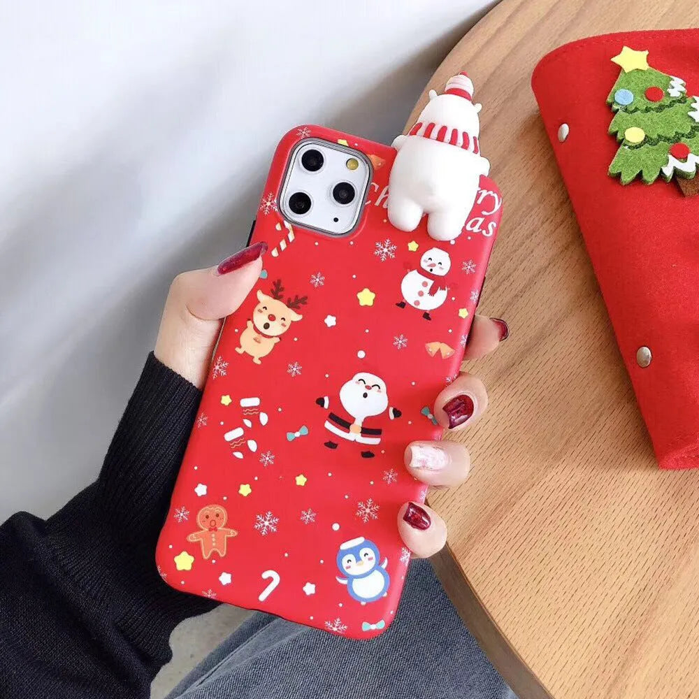 Christmas-themed silicone back cover case for iPhone on a red background.