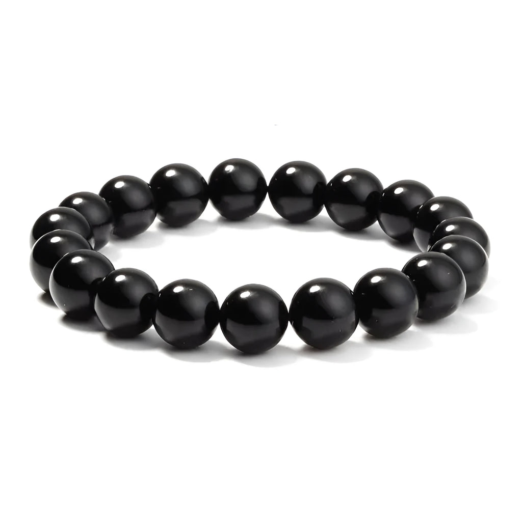 Women's geometric black agate bracelet with 8mm beads on a black elastic cord.
