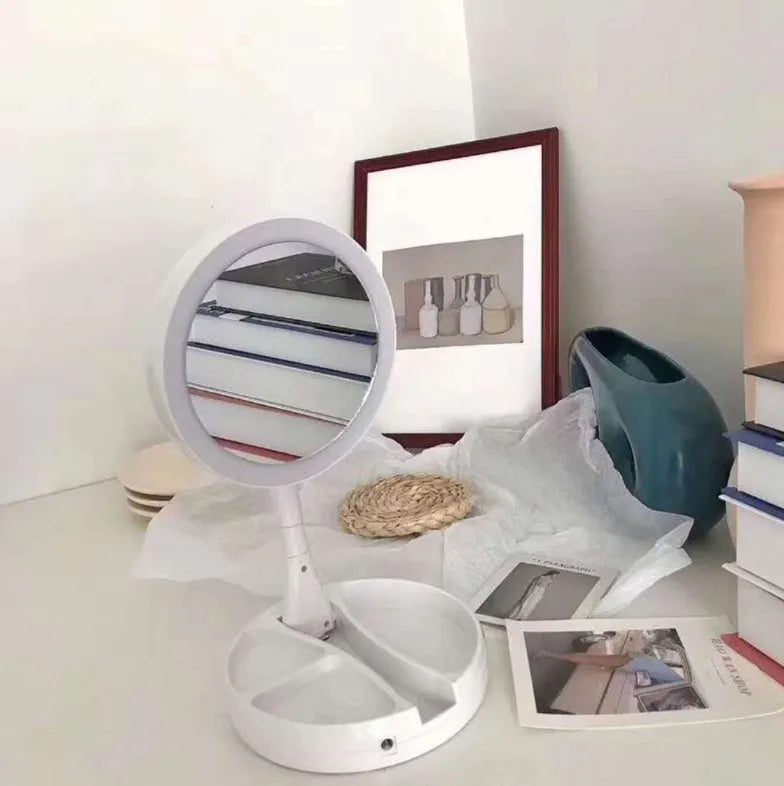 White acrylic frame LED vanity mirror with USB charging and foldable design