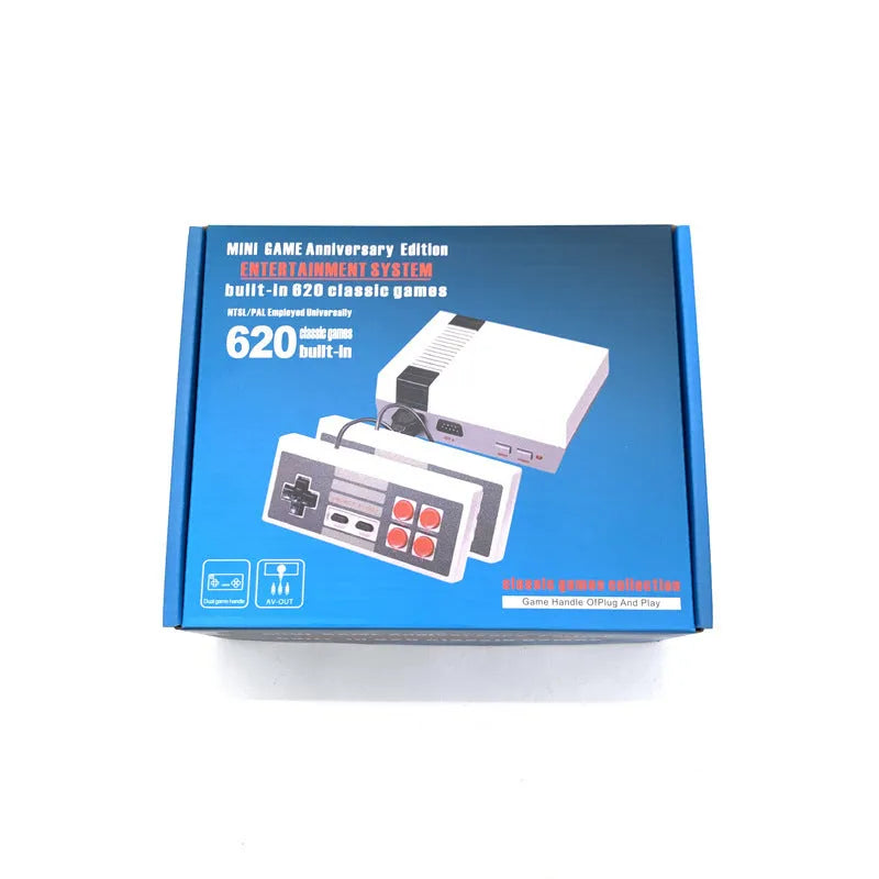 Red and grey NES retro mini game console with two rectangular controllers on a table.