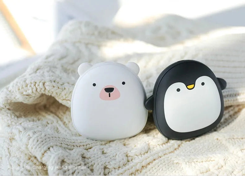 Cartoon penguin and polar bear USB rechargeable hand warmers showing front design