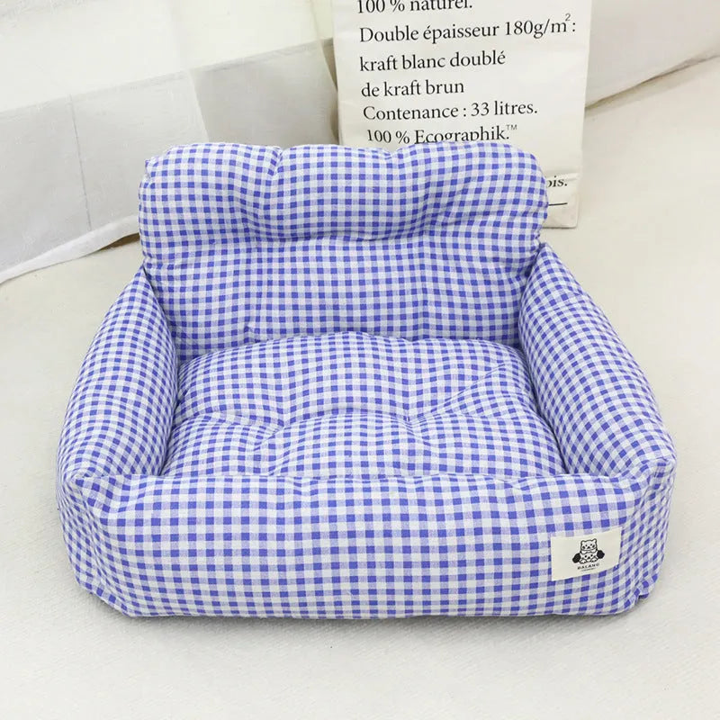Grey and blue plaid car-mounted pet travel nest for dogs with stain-resistant cloth material