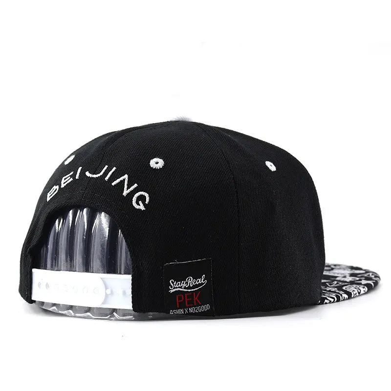 Embroidered letter baseball hat in cotton with adjustable strap, dome crown, black and white colour options
