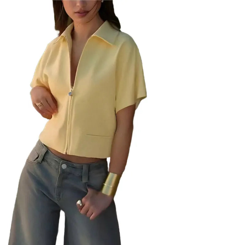 Loose fit casual polyester top in black, white or yellow with short sleeves