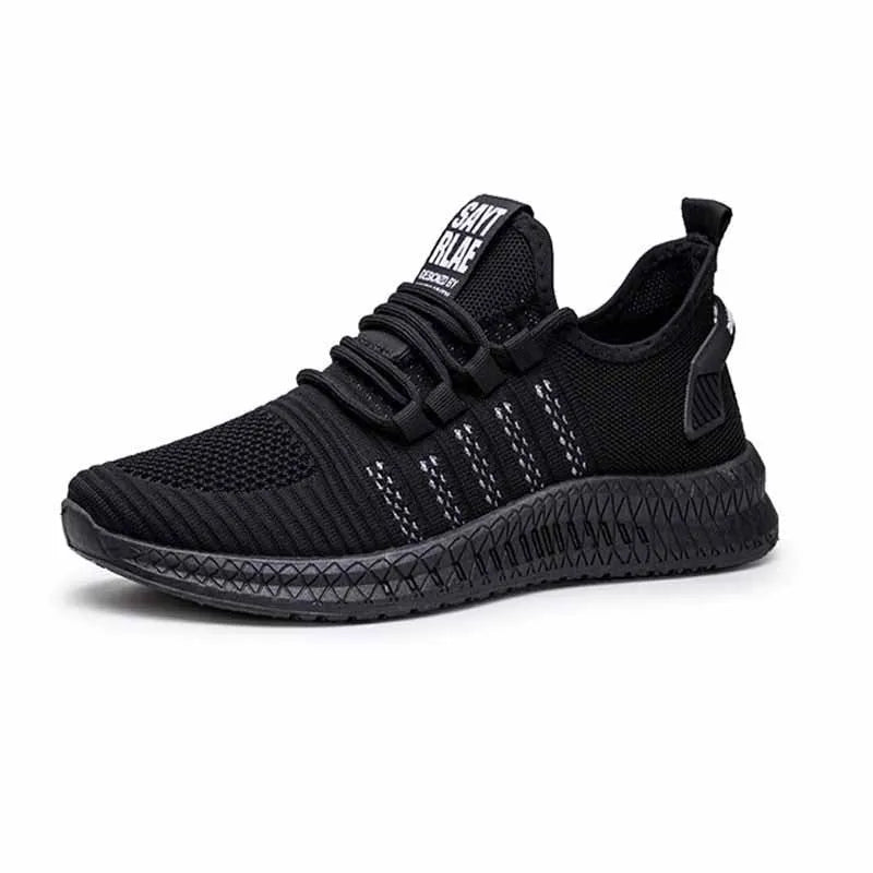 Men's black casual trainers with Flying Weave upper and cross strap detail on low-top sports shoes