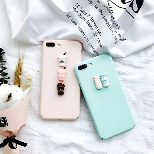 Soft pink silicone iPhone case with a raised 3D cartoon cat design on the back.