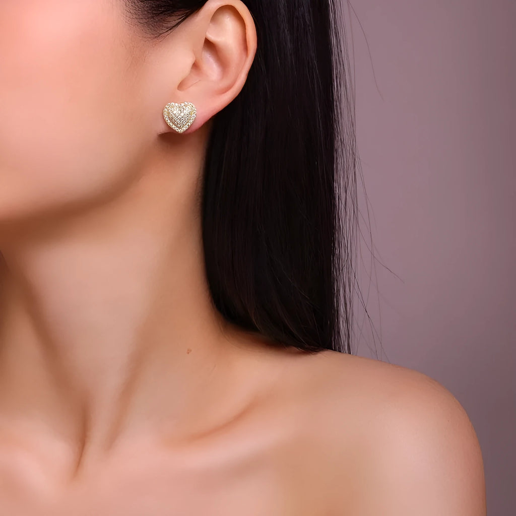 Golden heart-shaped moissanite stud earrings with S925 silver construction and simple fashion design