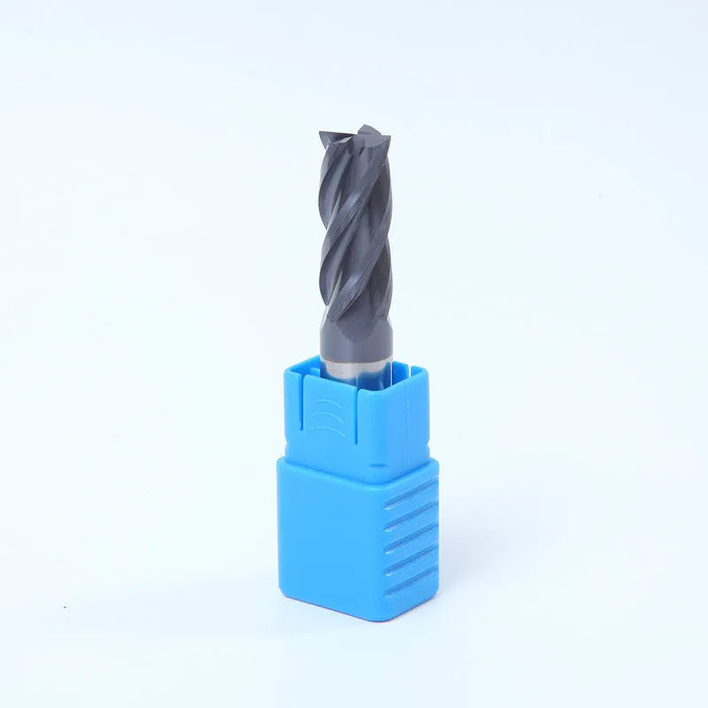 Carbide milling cutter with straight shank and spiral cutting edge on a dark background.