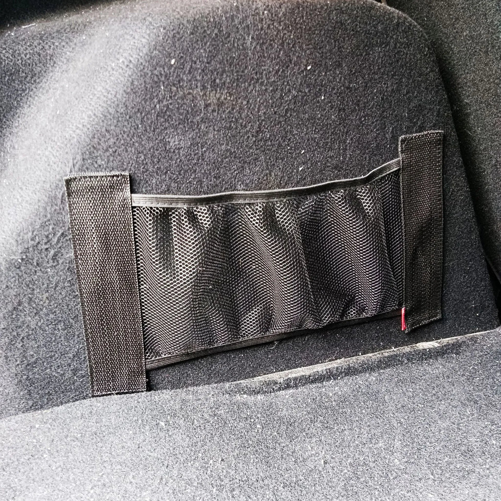 Elastic polyester car boot storage net shown in 20x45cm size securing loose items.