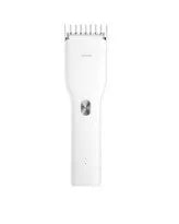 Black and white cordless electric hair clipper with ceramic cutter head and adjustable comb.