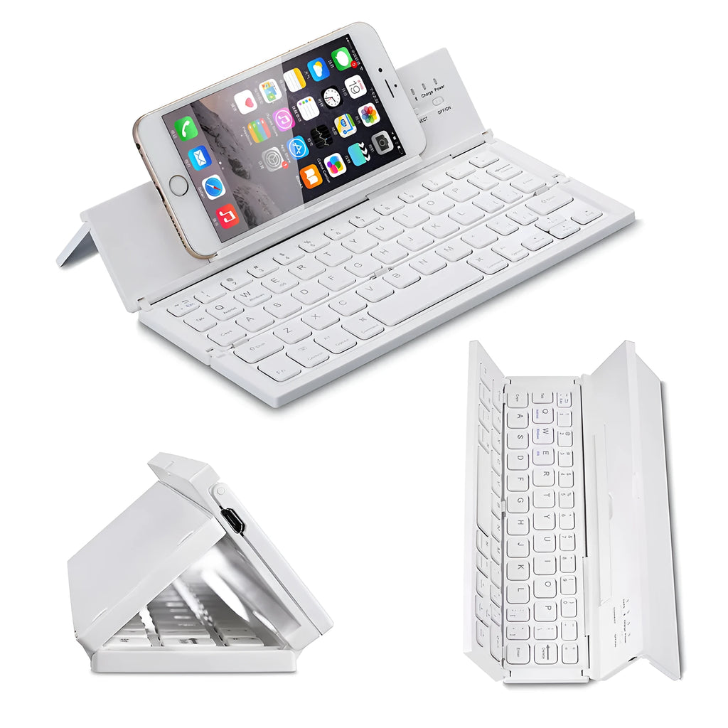 Black folding Bluetooth wireless keyboard next to tablet showing compact portable design